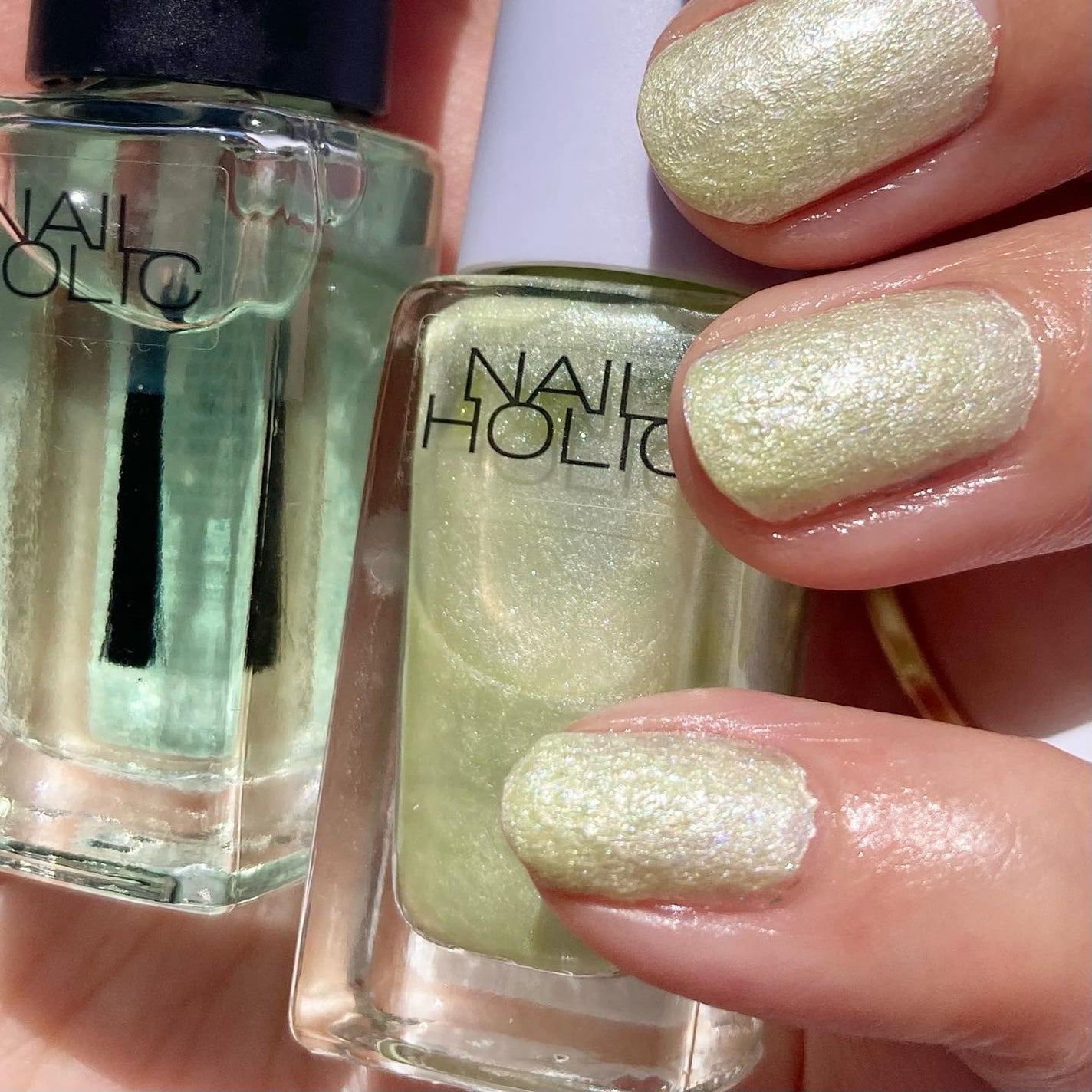 しろいぱんだ on LIPS 「NAILHOLICの限定春ネイル🌱春のニットをイメージしたよう..」(5枚目)