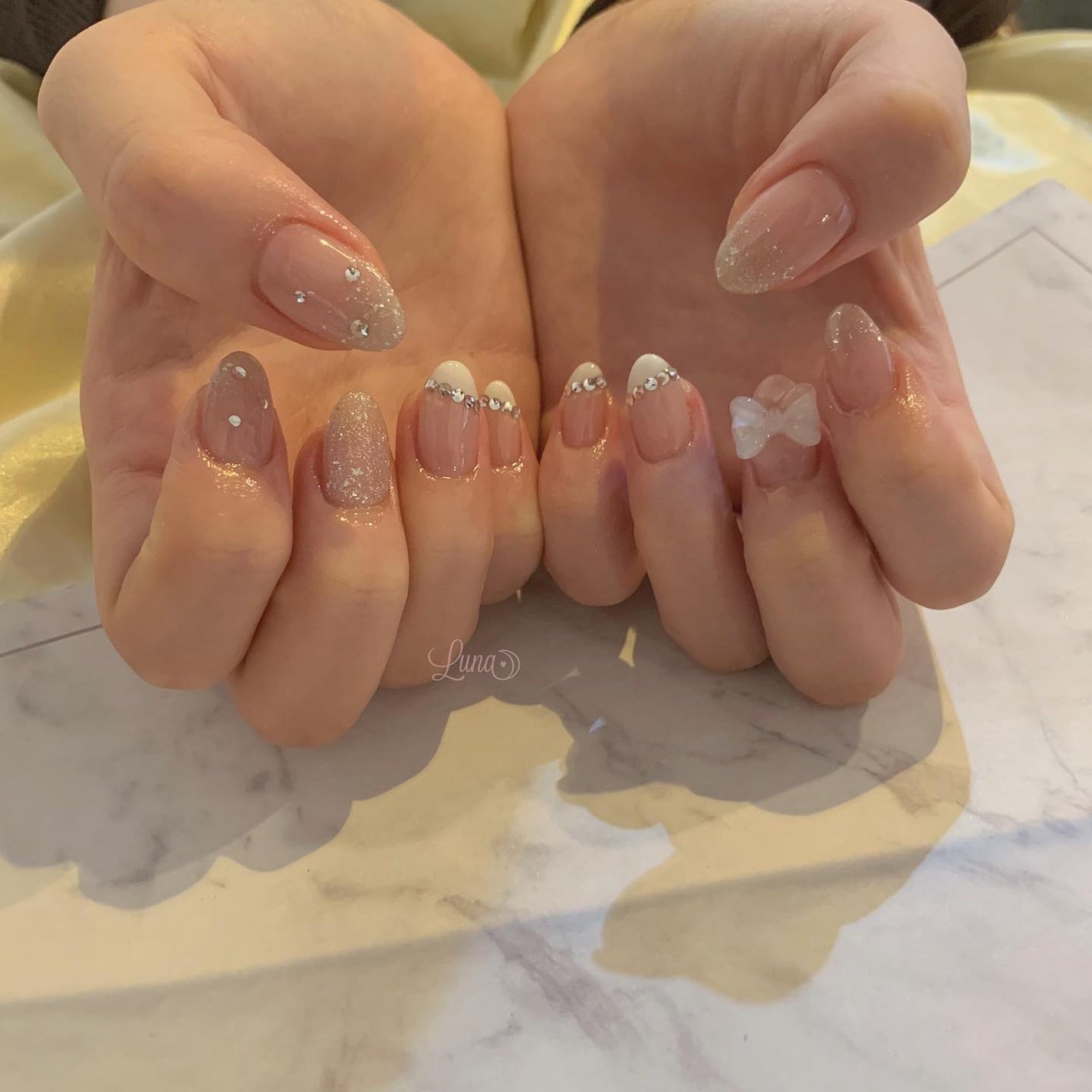 Iuna. Mizuki on LIPS 「.やりたいの詰め込み🤍🎀#nail#nailstagram#g..」(1枚目)