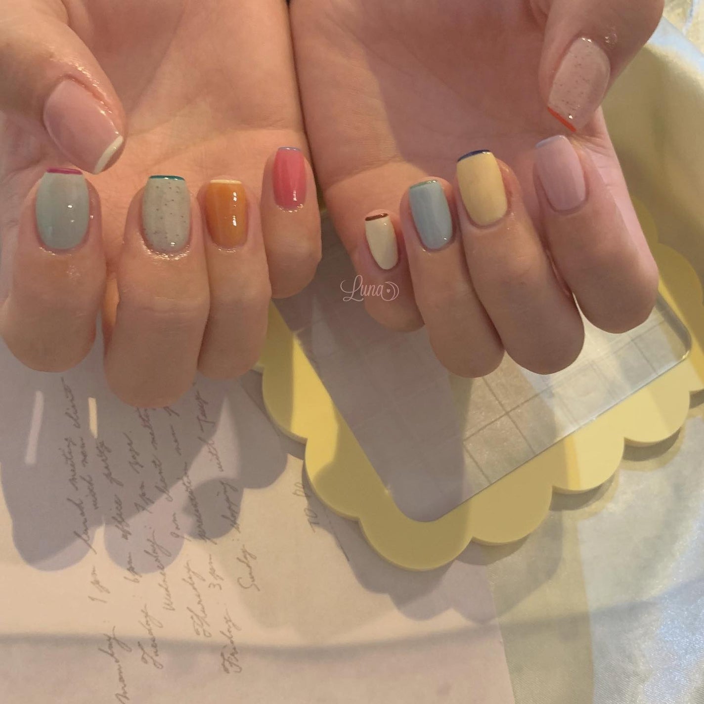 Iuna. Mizuki on LIPS 「.🌸🌼💦🍈🤍#nail#nailstagram#gelnail..」(2枚目)