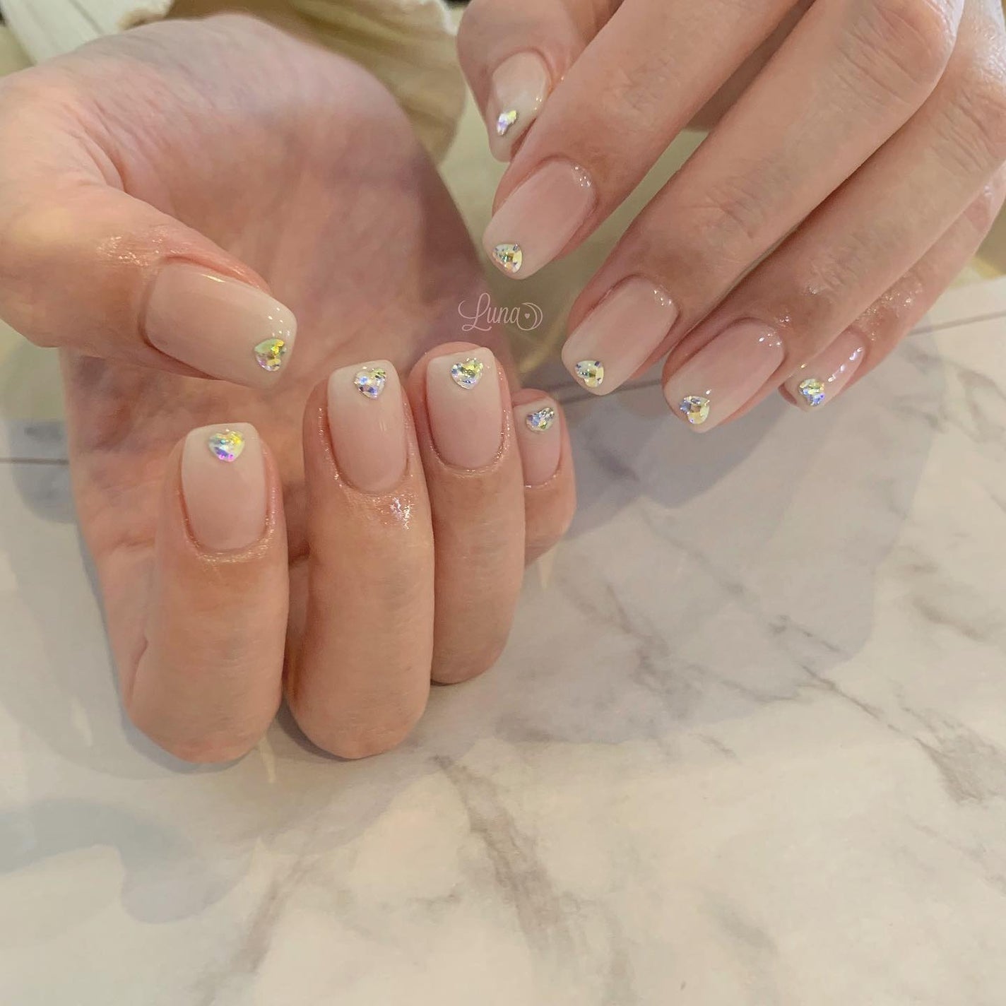 Iuna. Mizuki on LIPS 「.🤍🎀#nail#nailstagram#gelnail#ジ..」(1枚目)