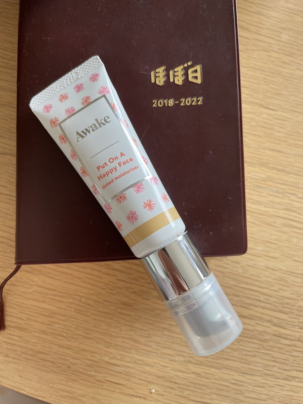 プットオンアハッピーフェイス ティンティド モイスチュアライザー 01 light medium/Awake/CCクリームを使ったクチコミ（1枚目）