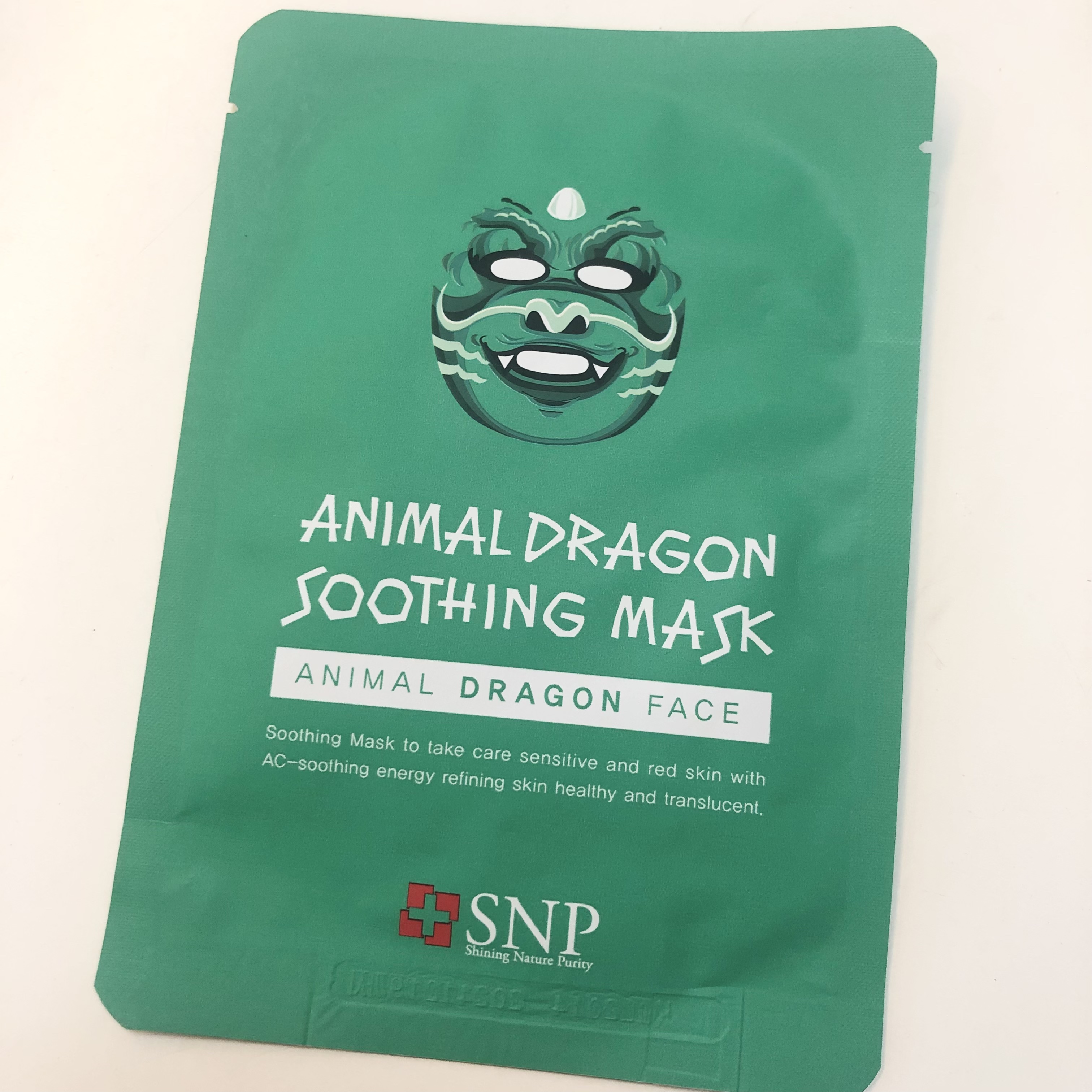 SNP アニマルフェイスマスク ドラゴンのクチコミ「【SNP アニマルフェイスマスク ドラゴン】

SNPのユニークなシートマスク！
ドラゴン柄が.....」（1枚目）