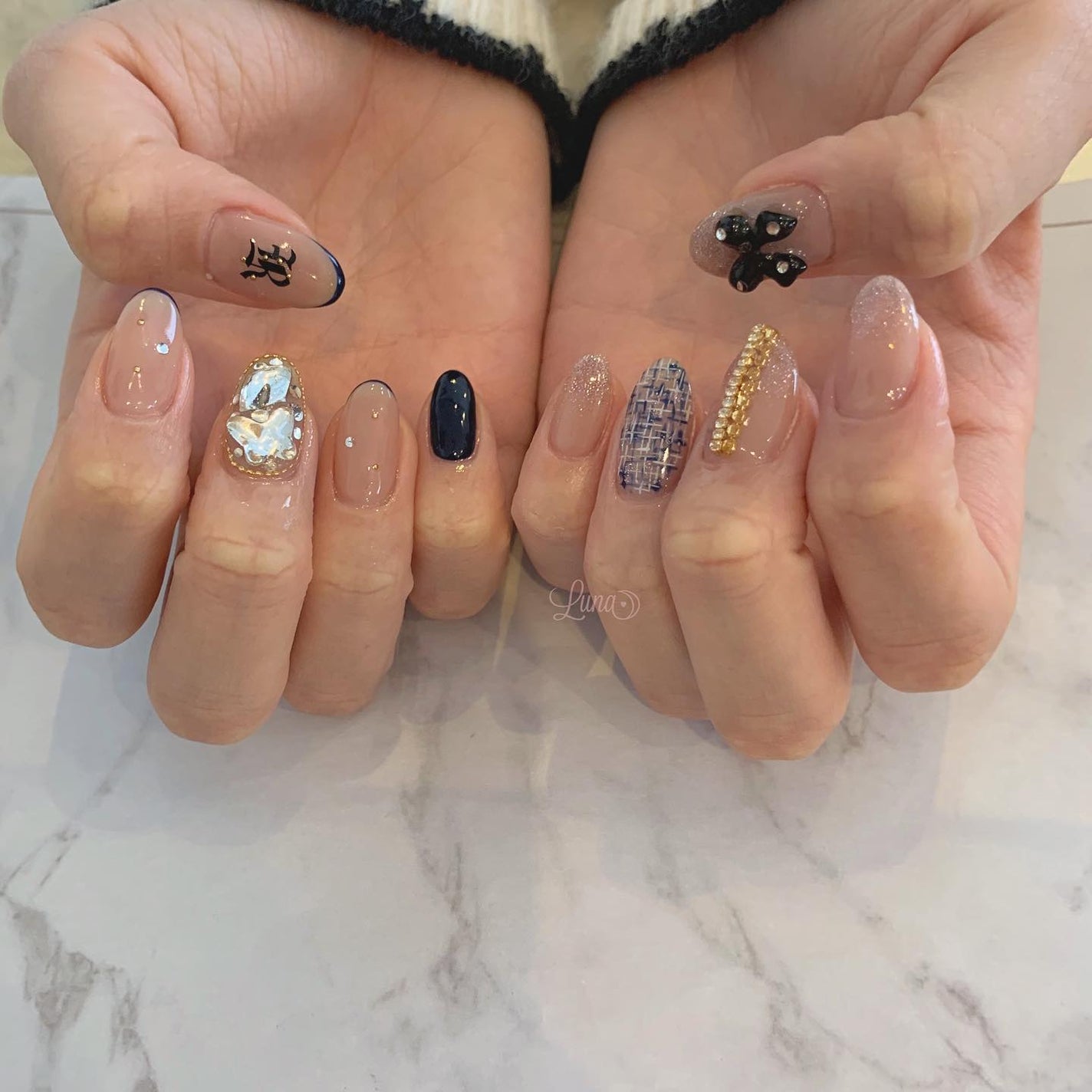 Iuna. Mizuki on LIPS 「.過去の私のネイルとおそろいに✨スペシャルプラン♡#nail#..」(1枚目)