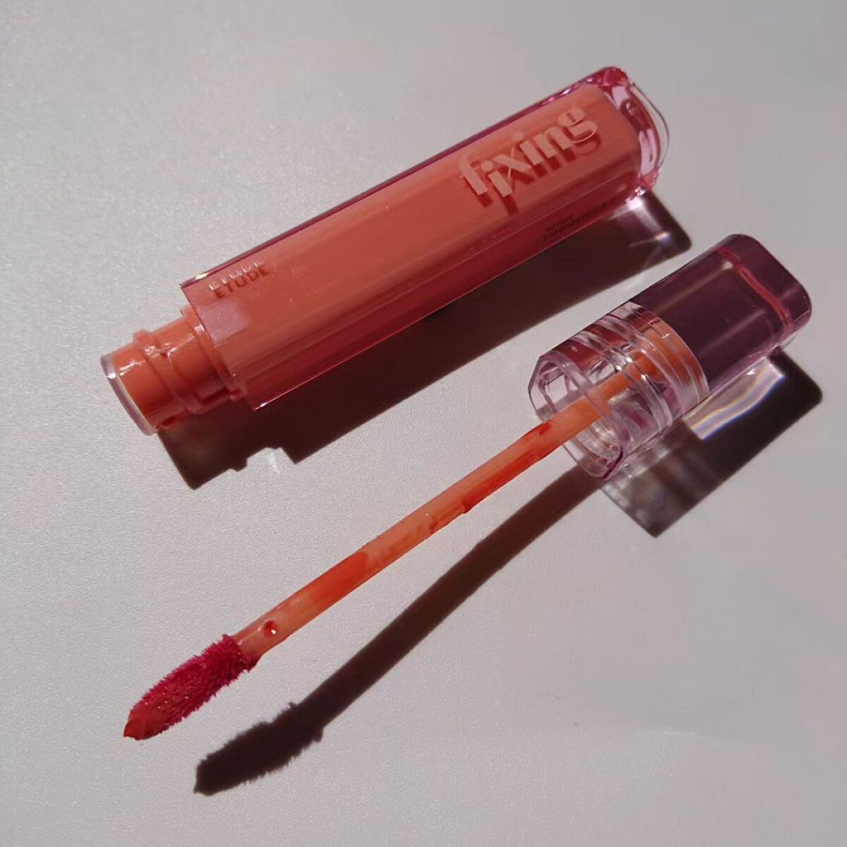 グロウ フィクシングティント ピュアコーラル/ETUDE/リップティントを使ったクチコミ（3枚目）