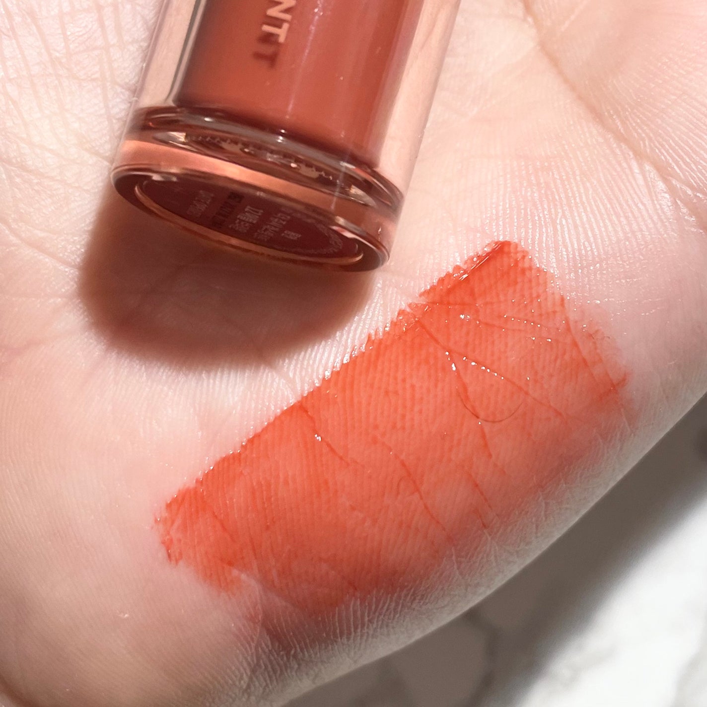 ジューシーラスティングティント/rom&nd/リップティントを使ったクチコミ(2枚目)