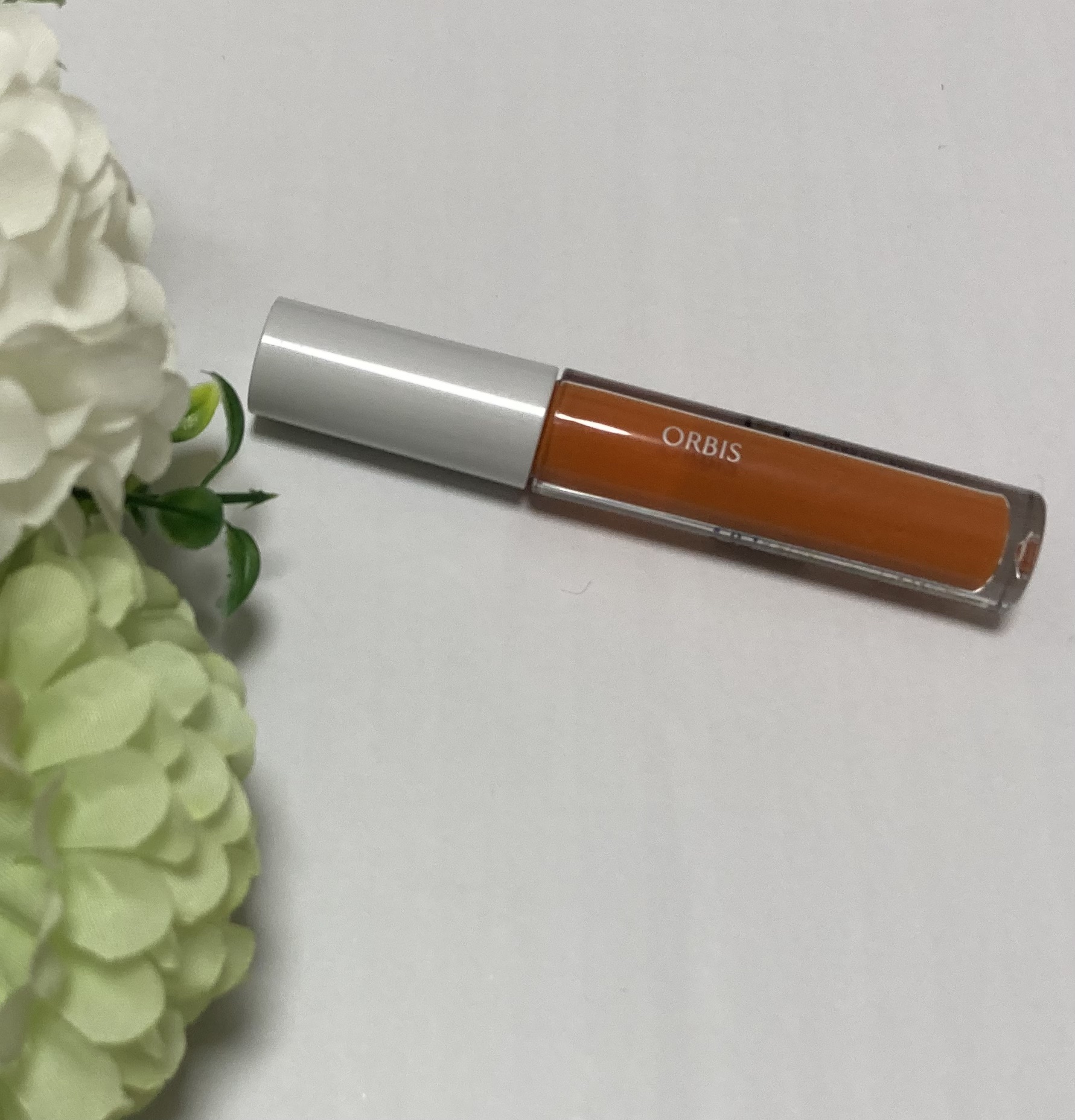 オルビス カラーエッセンスリキッドのクチコミ「オルビスのカラーエッセンスリキッド、サンセットオレンジを購入しました。

冬にピッタリなうるう.....」（1枚目）