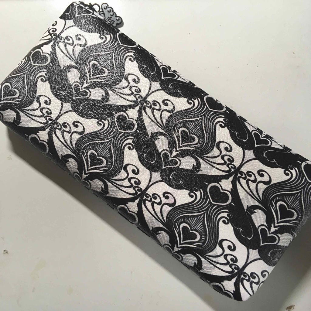 ANNA SUI ミニチュア ポーチコレクションのクチコミ「ANNA SUIのミニチュアコレクション。

全ボトル4mlで、入っている香水は
ロマンティカ.....」（2枚目）