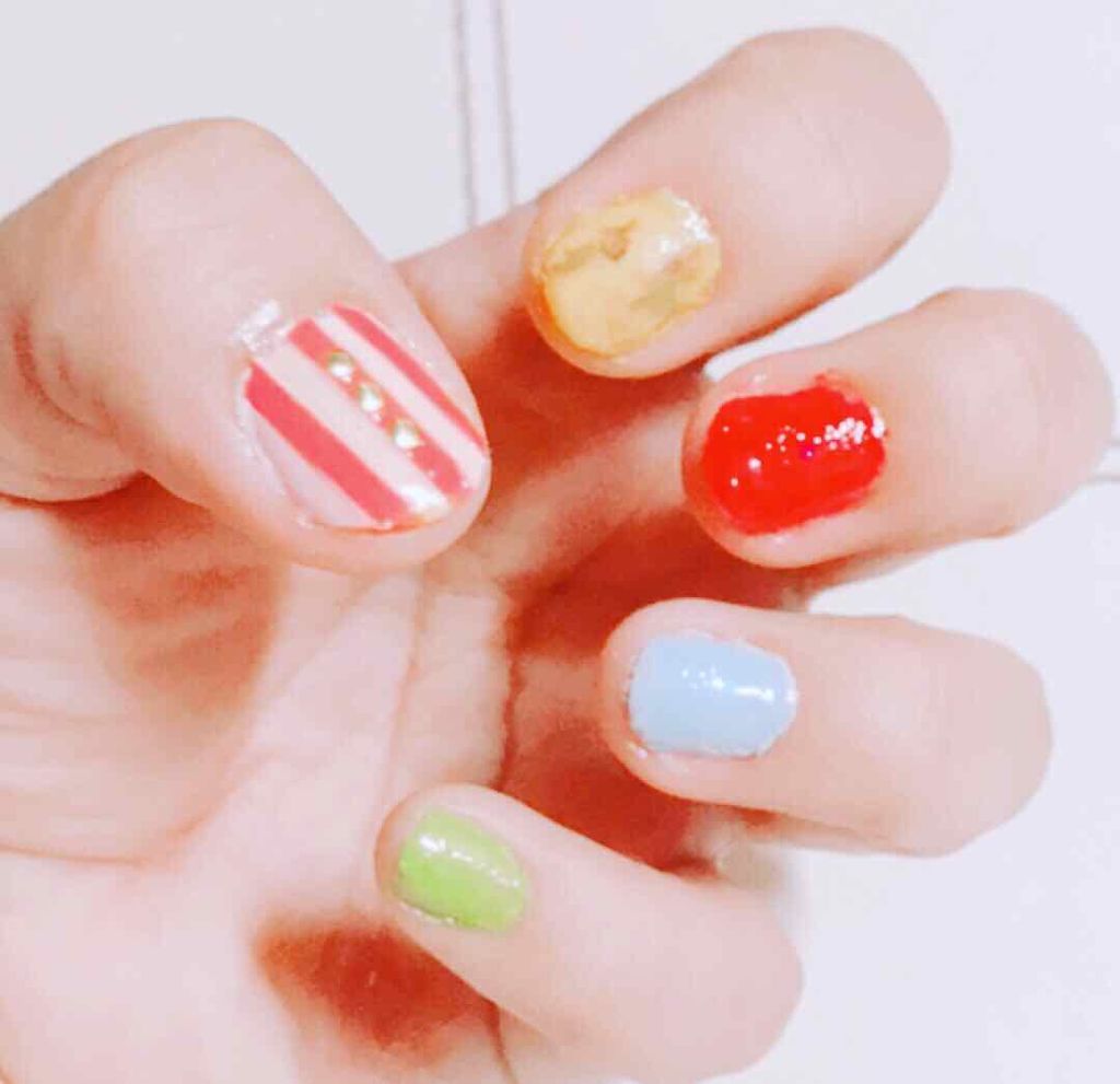 o_o.a_i on LIPS 「ユニバ*ハリポタネイル♡百味ビーンズネイルです!親指*パッケー..」(1枚目)