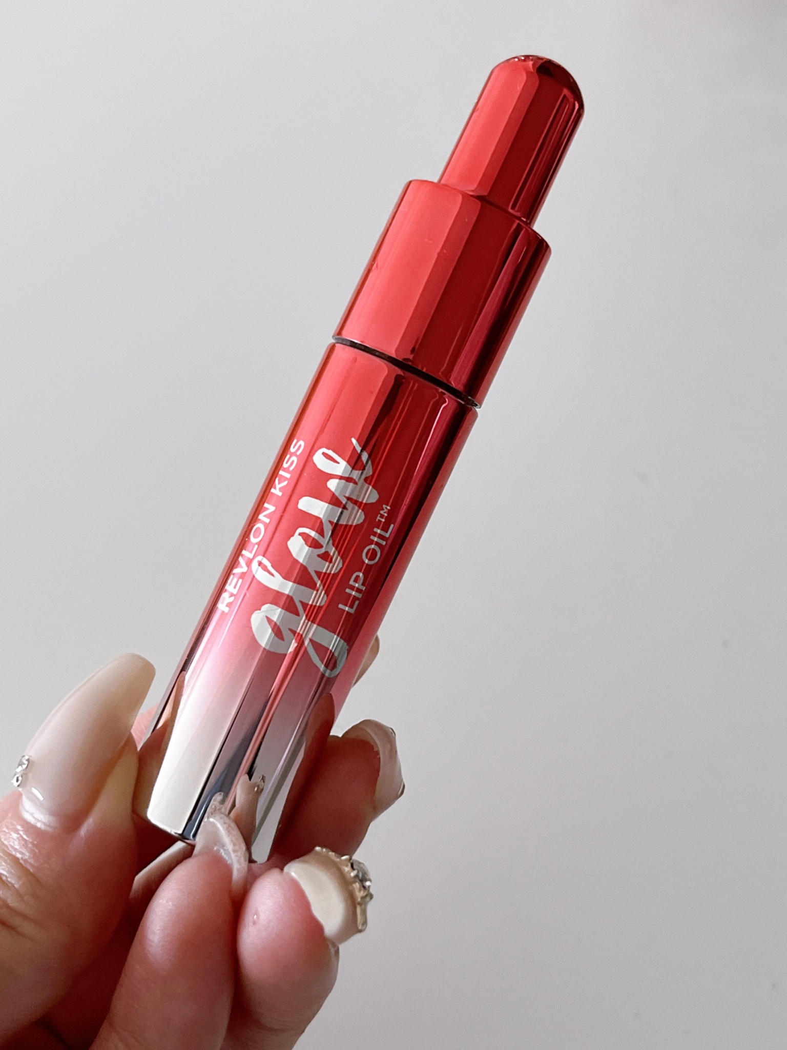 キス グロウ リップ オイル 005 コーラル フラッシュ/REVLON/リップグロスを使ったクチコミ（2枚目）