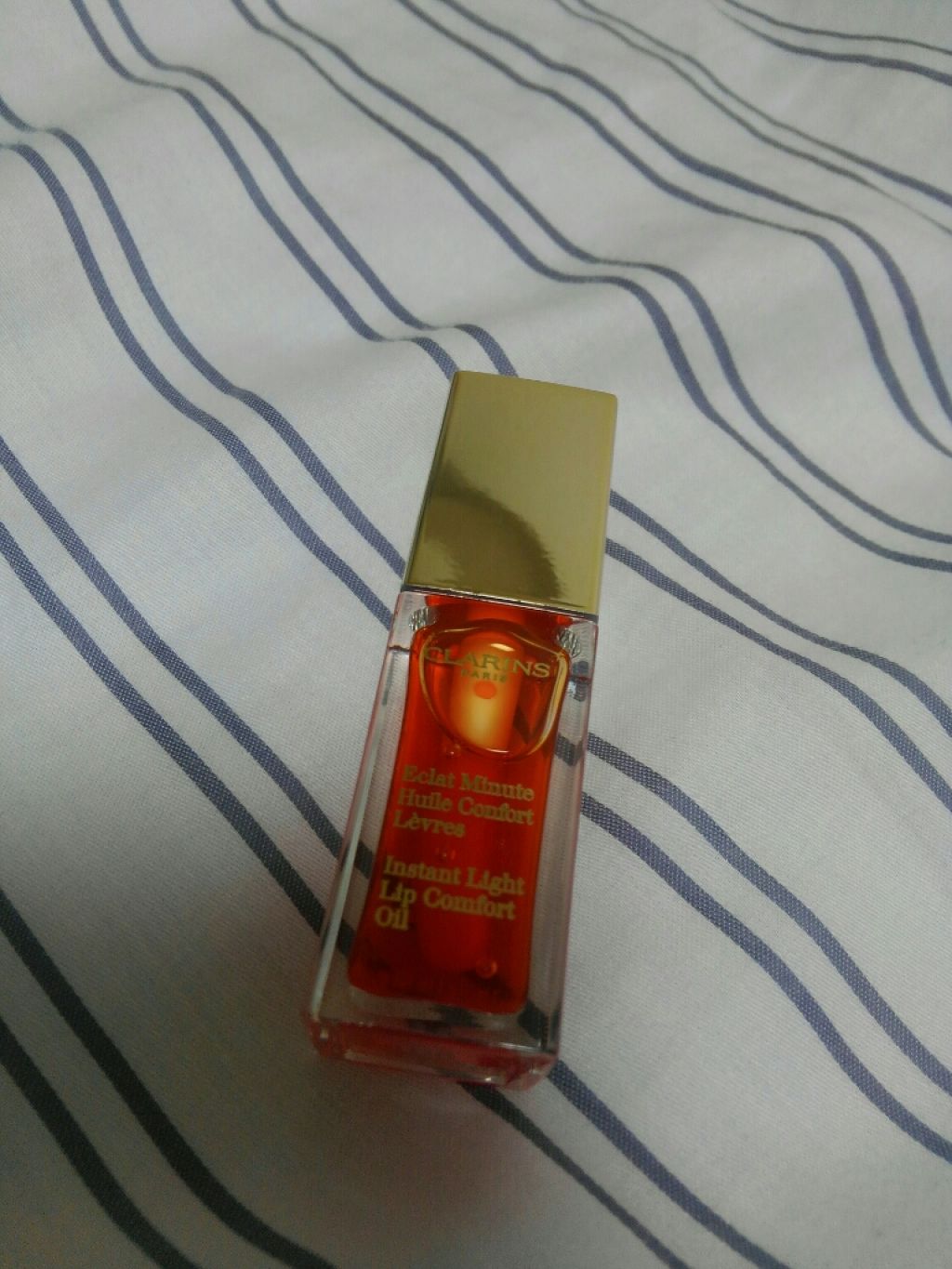 コンフォート リップオイル  05 tangerine /CLARINS/リップグロスを使ったクチコミ（1枚目）
