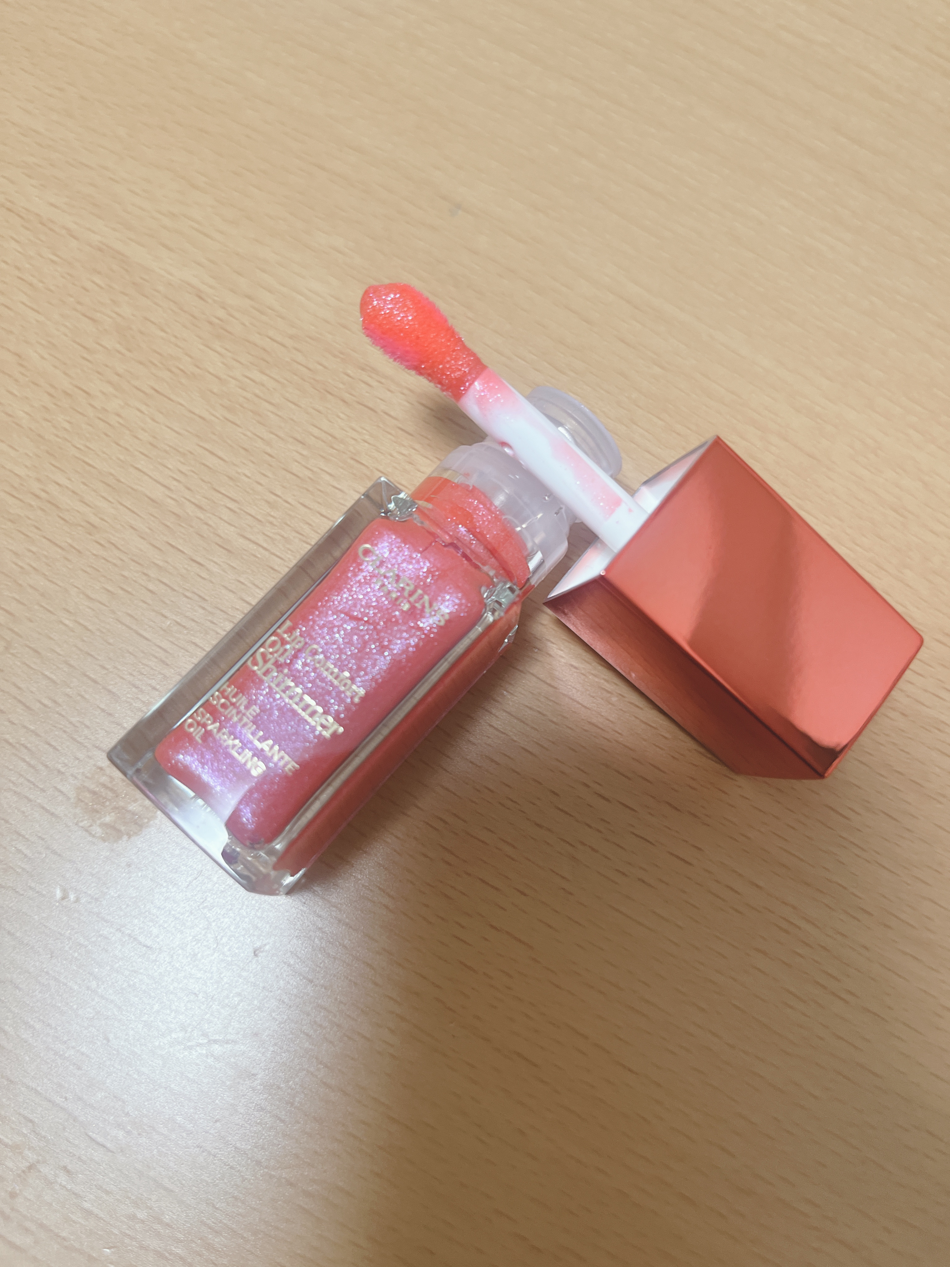 コンフォート リップオイル シマー 06 ポップコーラル/CLARINS/リップグロスを使ったクチコミ（2枚目）