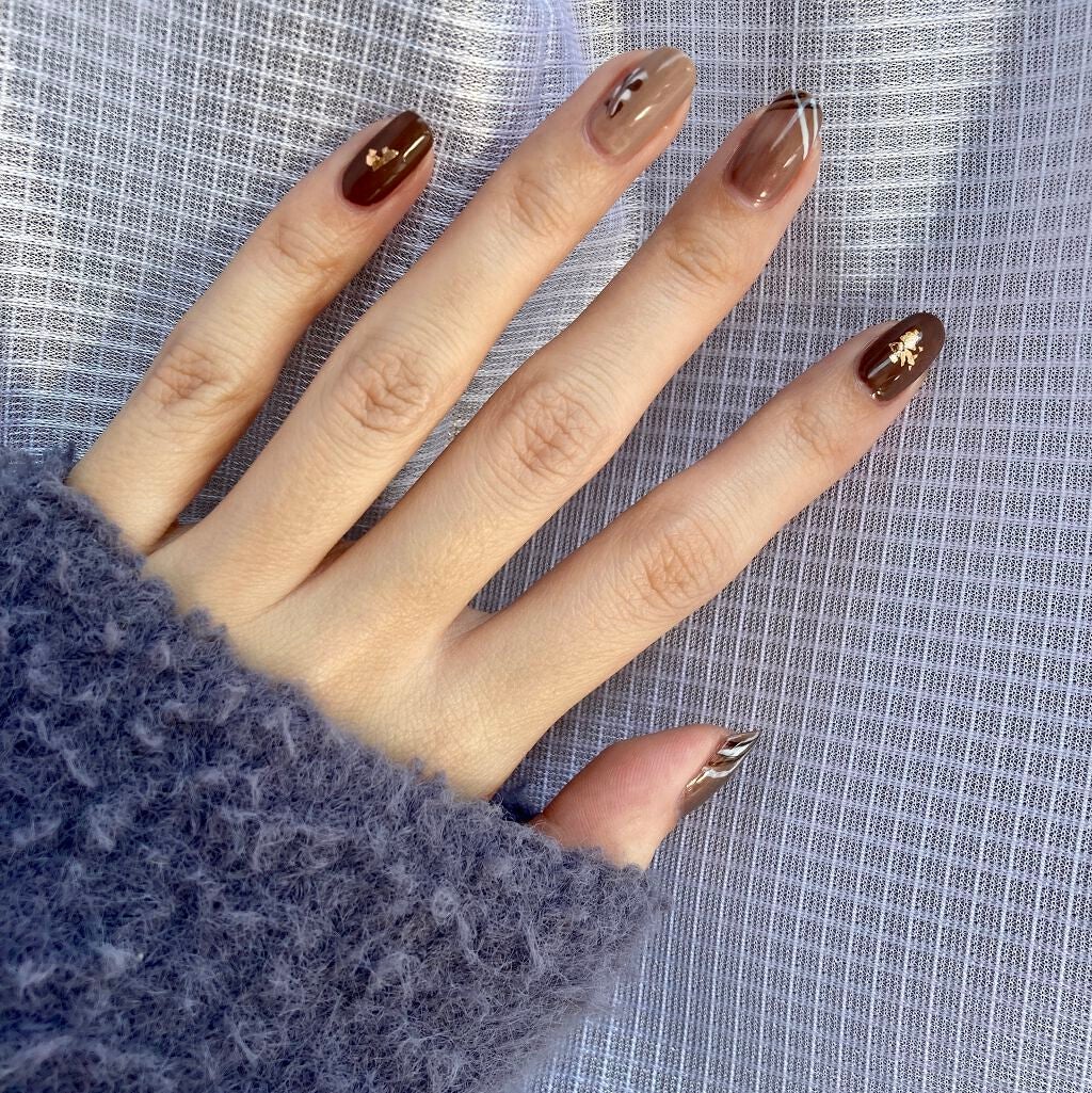 はるちゃんまん on LIPS 「少し早めのバレンタインネイルケアチョコっぽく仕上げてみました🍫..」(1枚目)