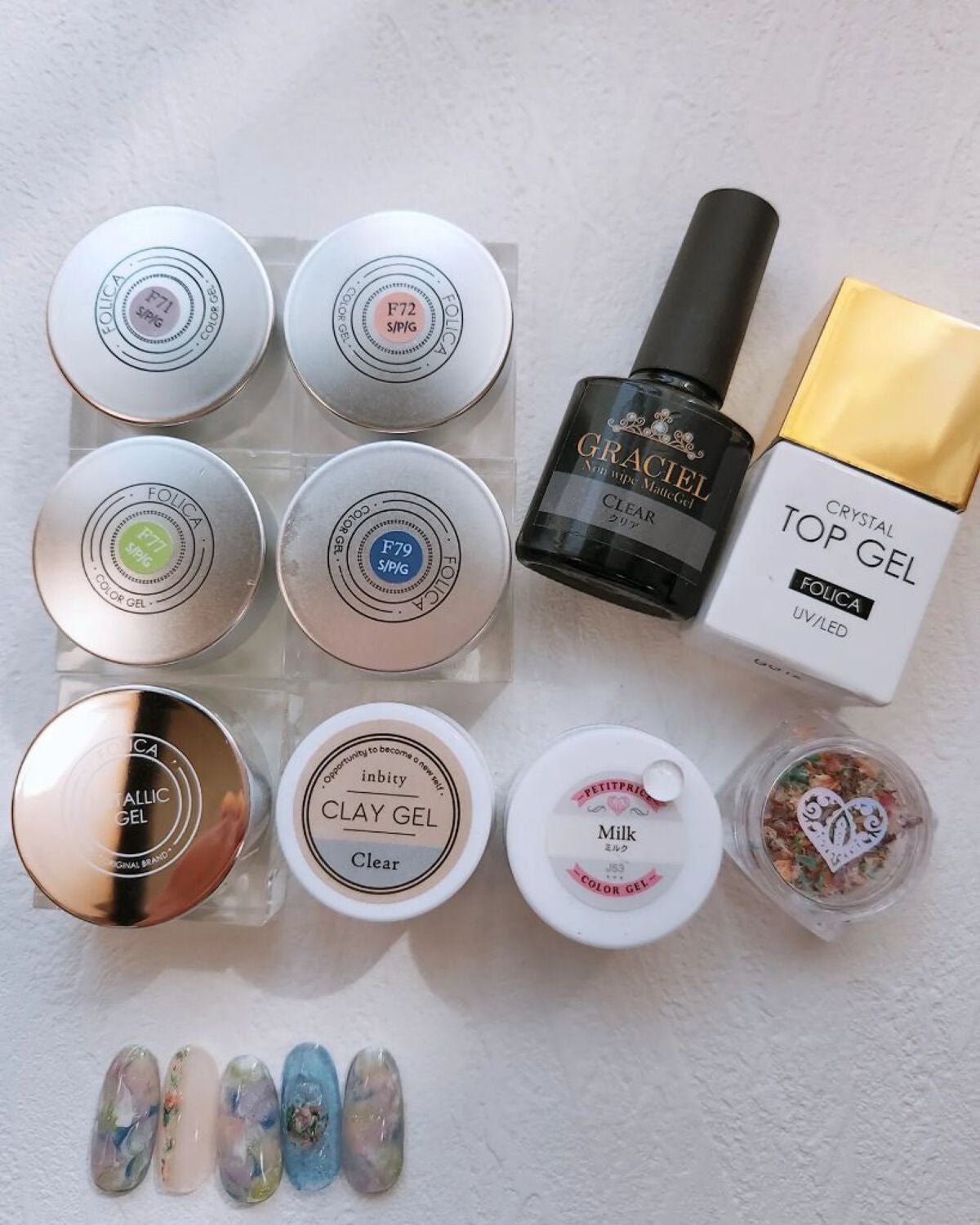 e_nails//フォロバ◎//ネイルとコスメ好きママ on LIPS 「こんにちは🤍今回はお花をイメージしたニュアンスデザインです❀◆..」(2枚目)