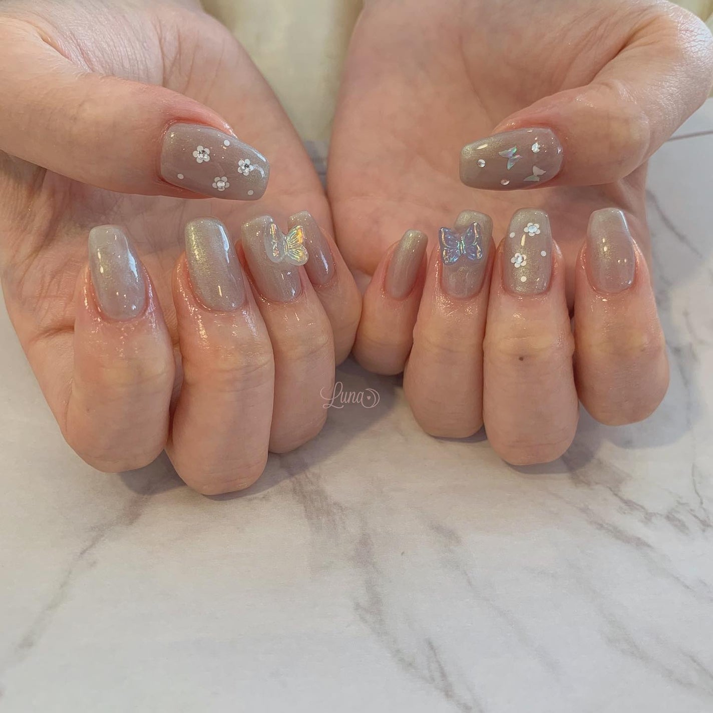 Iuna. Mizuki on LIPS 「.春仕様に🌸#nail#nailstagram#gelnail..」(1枚目)