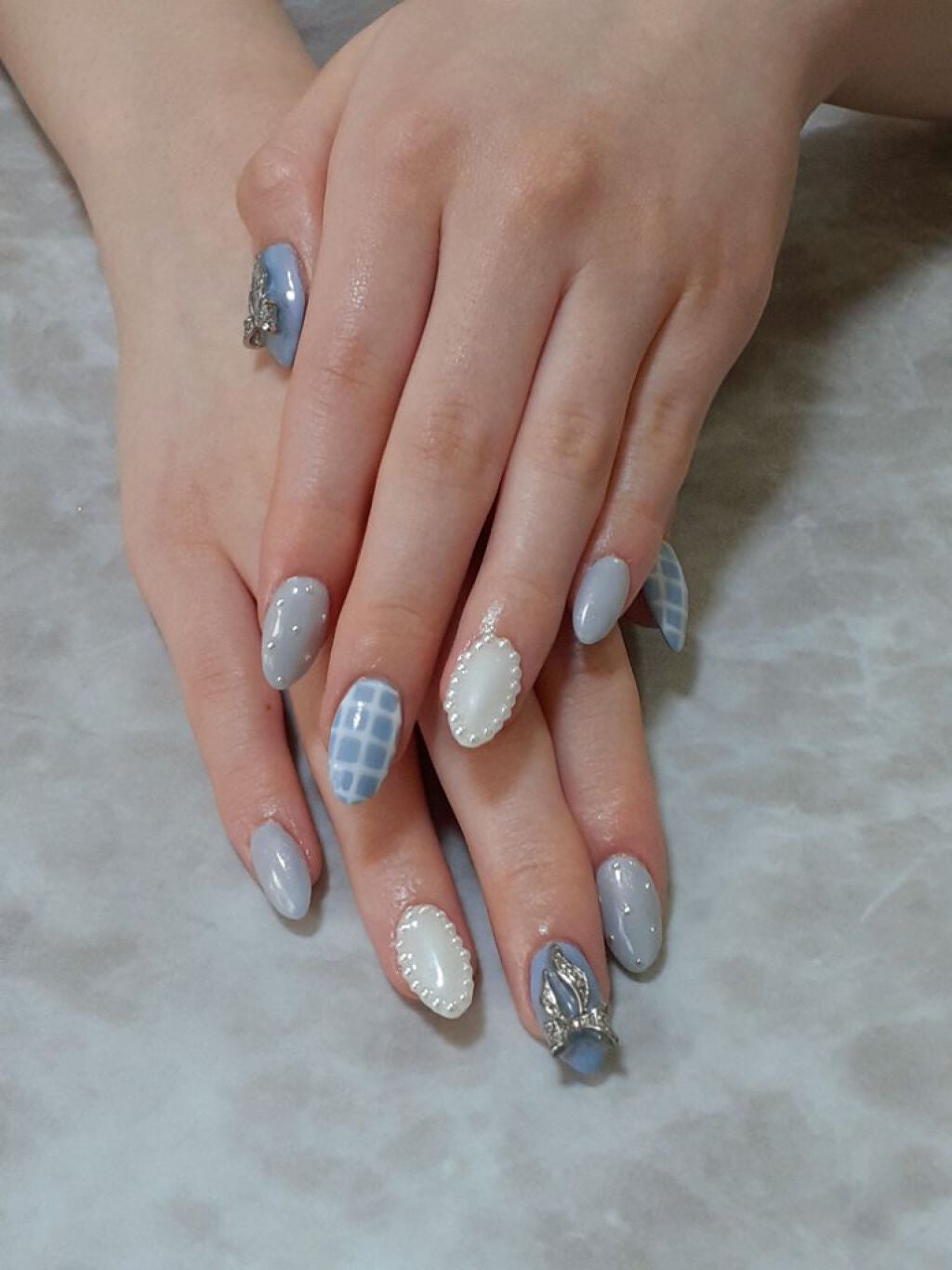 r.kira.nail on LIPS 「お客様ネイルです🤗🤍暖かくなってきたから爽やかなカラーにしたく..」(1枚目)