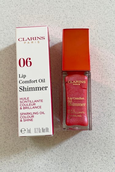 コンフォート リップオイル シマー 06 ポップコーラル/CLARINS/リップグロスを使ったクチコミ（1枚目）