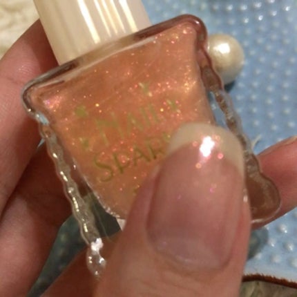 DAISO ウィンマックス ネイルスパークスのクチコミ「ダイソーで大好物のピンクのきらきらを発見👀💕
ウィンマックスネイルスパークスのオーロラコート.....」(2枚目)