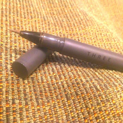 THREE キャプティベイティングパフォーマンスフルイドアイライナーのクチコミ「THREE キャプティペインティングパフォーマンス
フルイドアイライナー 04
EYES O.....」(1枚目)