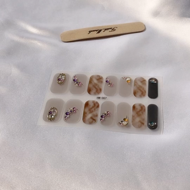 Qoo10 ネイルシールのクチコミ「Qoo10で1枚65円になっていたネイルシールを買いました💅
柄によっては+40円とかあります.....」(3枚目)