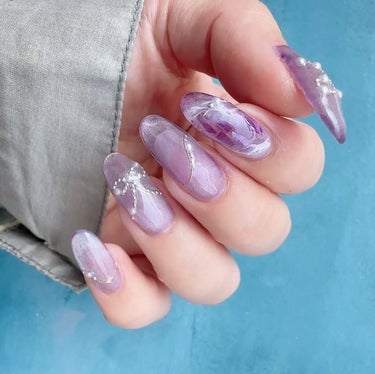 NAILTOWN マジックパウダーペンのクチコミ「手描き×パーツでリボン🎀ネイル
⠀
1.カラーを塗ったらマットコート（硬化）
2. icing.....」（3枚目）